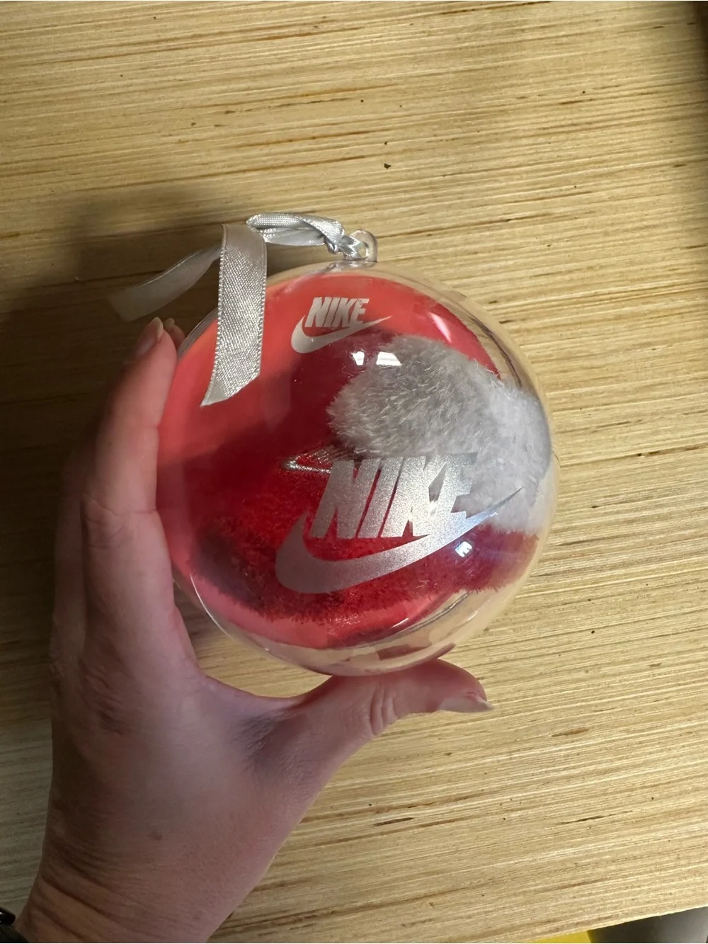 Nike Red and White Holiday Ornament Ball with Baby Booties